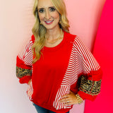 Red, stripe, and leopard oversized Dolman style long sleeve sweatshirt.