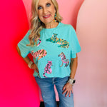 Mint  short sleeved tee with sequin safari animals.