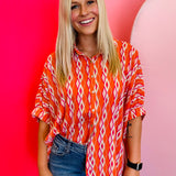Tangerine Print Dolman Sleeve Top