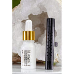 Thomas Blonde - A sleek, metallic, cylindrical car vent diffuser clip with a white dot for adjusting fragrance.