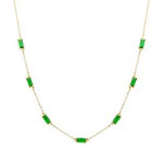 Gold chain necklace with stationed rectangular emerald stones, adjustable 16–18 inch length.