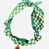 Green and white checkered football charm scarf necklace, adjustable tie design, perfect for game day wear.