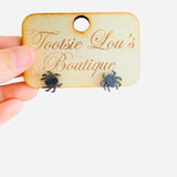 Black acrylic spider stud earrings.