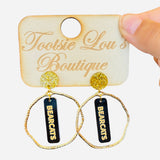 Gold hoops with black dangles and gold writing that says Bearcats set on gold glitter stud