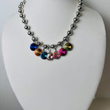 silver beaded necklace with multicolor rhinestone charms