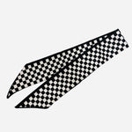 Black and white checkered scarf tie styled as twilly or chic scarf necklace.