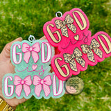 Pink God Is Good car freshie with leopard print bows and hook for hanging.