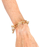 Gold linked bracelet with water-resistant finish, perfect for daily wear and stylish layering.