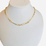 Gold necklace with alternating paperclip links and magnetic clasp for easy, modern style.