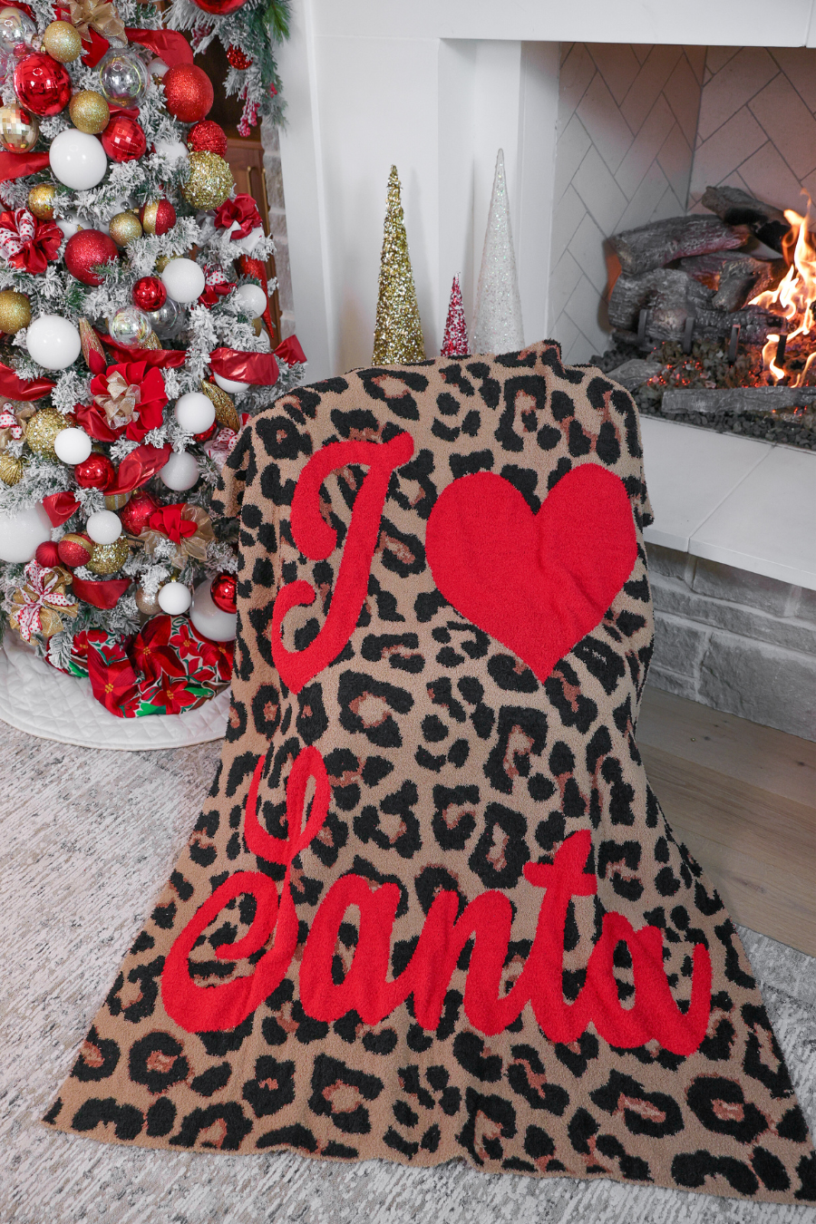 Leopard print I Love Santa blanket with bold red lettering, 50x57 inches.