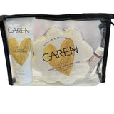 A pampering gift set including Loved hand cream, a soap sponge, and lip balm.