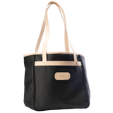 Jon Hart Amelia Tote in black coated canvas with natural leather trim, padded laptop sleeve, trolley sleeve, and spacious interior pockets