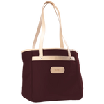 Jon Hart Amelia Tote in burgundy coated canvas with natural leather trim, padded laptop sleeve, trolley sleeve, and spacious interior pockets