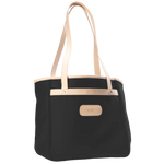 Jon Hart Amelia Tote in black coated canvas with natural leather trim, padded laptop sleeve, trolley sleeve, and spacious interior pockets