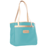 Jon Hart Amelia Tote in ice blue coated canvas with natural leather trim, padded laptop sleeve, trolley sleeve, and spacious interior pockets