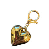 Gold acrylic oversized heart charm with silver accent, perfect for scarf necklaces or trendy jewelry.