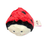 Ladybug Warmies® plush with red body, black spots, microwavable, lavender-scented, and weighted for comfort, safe for all ages.