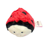 Ladybug Warmies® plush with red body, black spots, microwavable, lavender-scented, and weighted for comfort, safe for all ages.