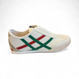White sneaker with red and green stripes and gold heel accent