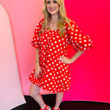 Red polka dot cotton dress with off-the-shoulder neckline, 3/4 balloon sleeves, and side pockets.