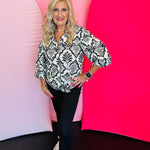 Black button-down blouse with baroque-inspired damask print, structured collar, and 3/4 length balloon sleeves with decorative trim.