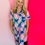 Two-piece lounge set in signature LuxBlend fabric featuring short sleeve, button-front top with contrast piping and matching elastic waist pants with drawstring.