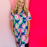 Two-piece lounge set in signature LuxBlend fabric featuring short sleeve, button-front top with contrast piping and matching elastic waist pants with drawstring.