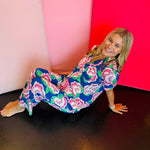 Two-piece lounge set in signature LuxBlend fabric featuring short sleeve, button-front top with contrast piping and matching elastic waist pants with drawstring.