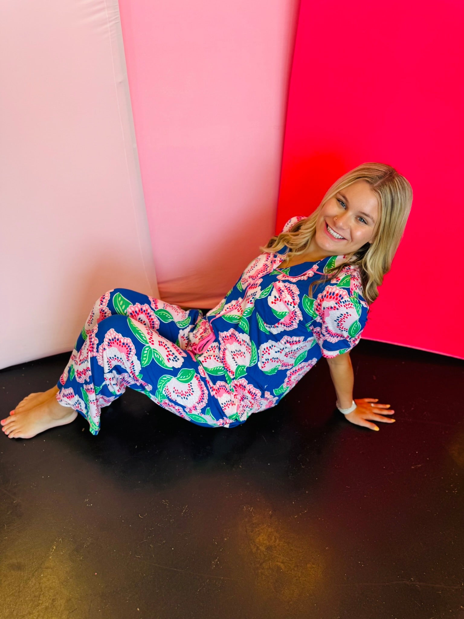 Two-piece lounge set in signature LuxBlend fabric featuring short sleeve, button-front top with contrast piping and matching elastic waist pants with drawstring.