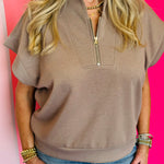 Cocoa brown half-zip high neck top made of soft scuba knit fabric, offering a relaxed and stylish everyday look.