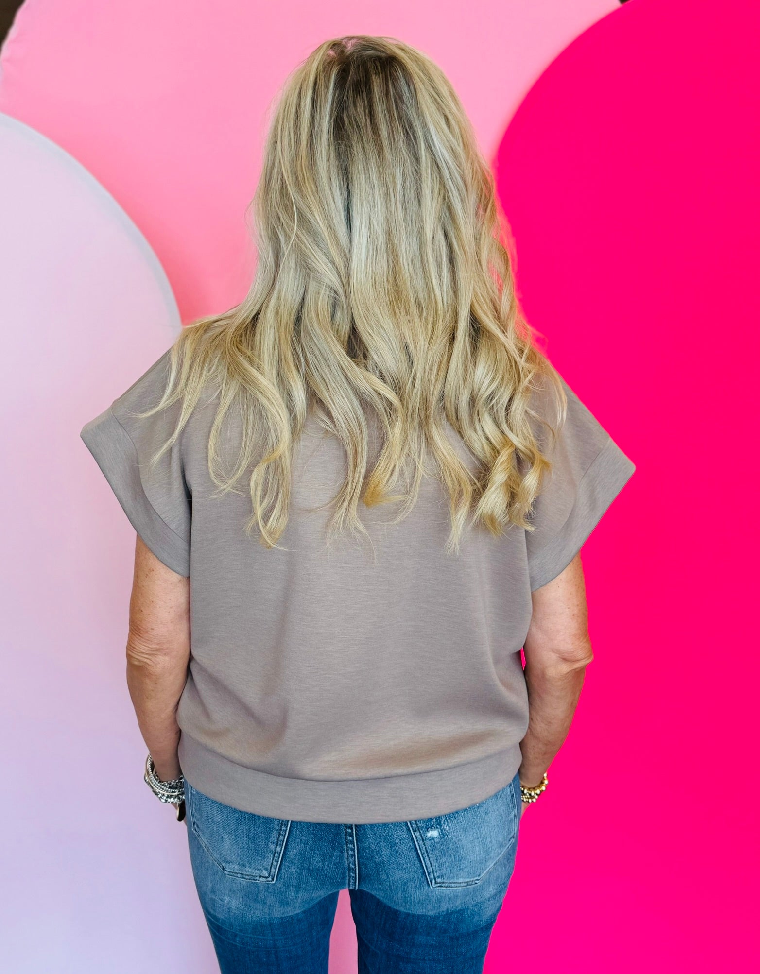 Cocoa brown half-zip high neck top made of soft scuba knit fabric, offering a relaxed and stylish everyday look.