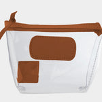Jon Hart Airport Chico clear TSA-compliant travel pouch with bridle Natural Leather trim, flat bottom, and zippered brass closure—perfect for carrying 3oz liquids and travel essentials.