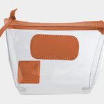 Jon Hart Airport Chico clear TSA-compliant travel pouch with orange Natural Leather trim, flat bottom, and zippered brass closure—perfect for carrying 3oz liquids and travel essentials.