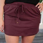 Burgundy skort with elastic waist and moisture wicking