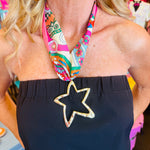 Multicolored retro-print scarf necklace featuring a hammered gold open star charm; vibrant hues of pink, teal, orange, and yellow add a playful, bold touch to any outfit.