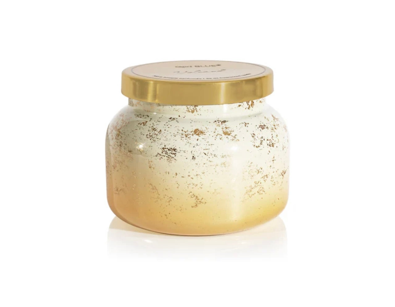 Capri Blue Volcano Glimmer Candle, 28oz, in a winter white  gold jar.