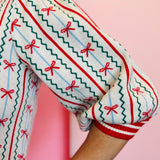 Faith In A Bow Sweater