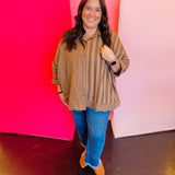 Mocha and cream striped button-down shirt with roll-tab sleeves and high-low hem.