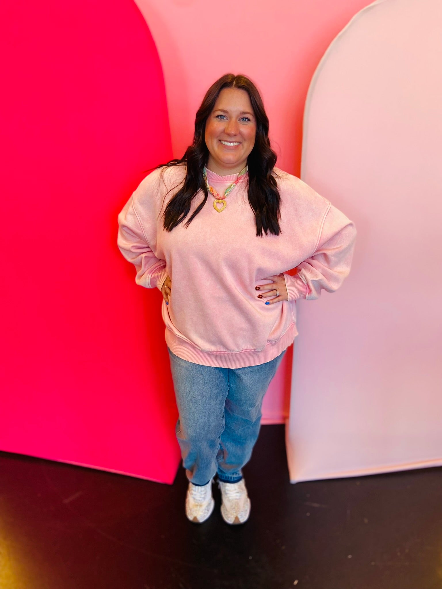 Plus-size dark pink acid wash oversized fleece pullover with balloon sleeves and overlap neckband.