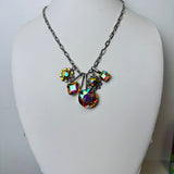 silver chain linked necklace with iridescent charms
