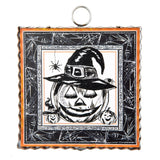 Smiling jack-o'-lantern in witch hat with pumpkins, spider, and spiderweb border with orange scalloped edge