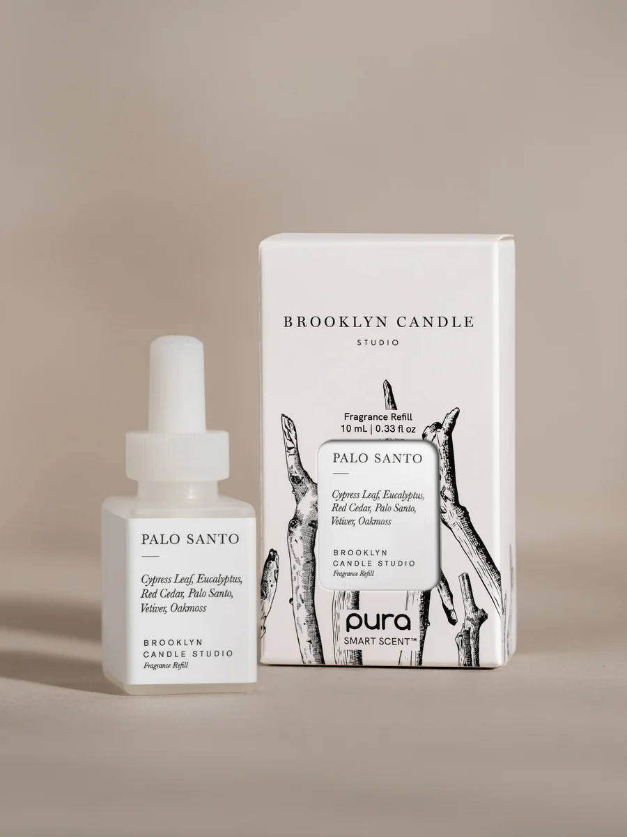 Pura Palo Santo fragrance refill bottle.