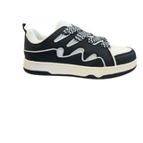 Black and white sneakers with a bold wave design, thick platform sole, and zigzag laces — modern, sporty, and edgy.