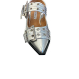 Silver pointed-toe flats with bold silver double buckle straps and a slingback backstrap, combining vibrant color with edgy charm.