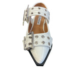 White pointed-toe flats with bold silver double buckle straps and a slingback backstrap, combining vibrant color with edgy charm.