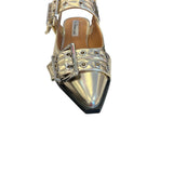 Gold pointed-toe flats with bold silver double buckle straps and a slingback backstrap, combining vibrant color with edgy charm.