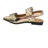 Gold pointed-toe flats with bold silver double buckle straps and a slingback backstrap, combining vibrant color with edgy charm.