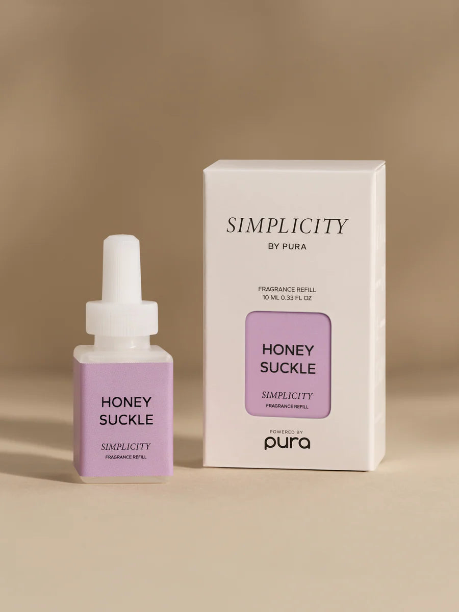 Pura Honeysuckle fragrance refill bottle.