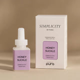 Pura Honeysuckle fragrance refill bottle.