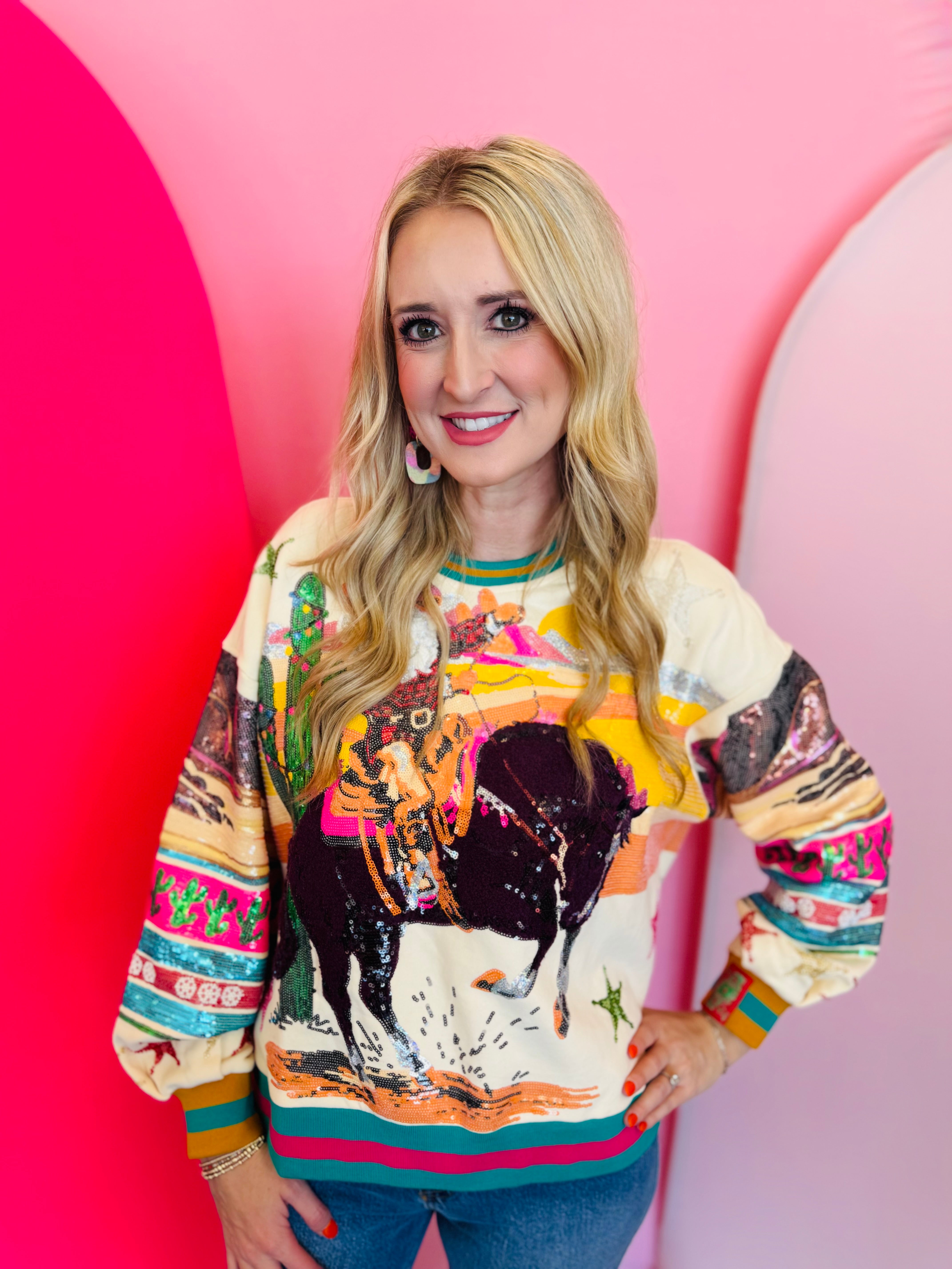 Queen of Sparkles Sequin Santa on horseback sweatshirt with desert sunset and Southwestern accents